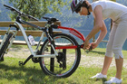 Trail Angel - cârlig de remorcare pentru bicicletă de copil - roșu